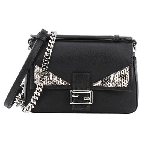 small leather crossbody bag by fendi with monster charm|fendi leather handbags.